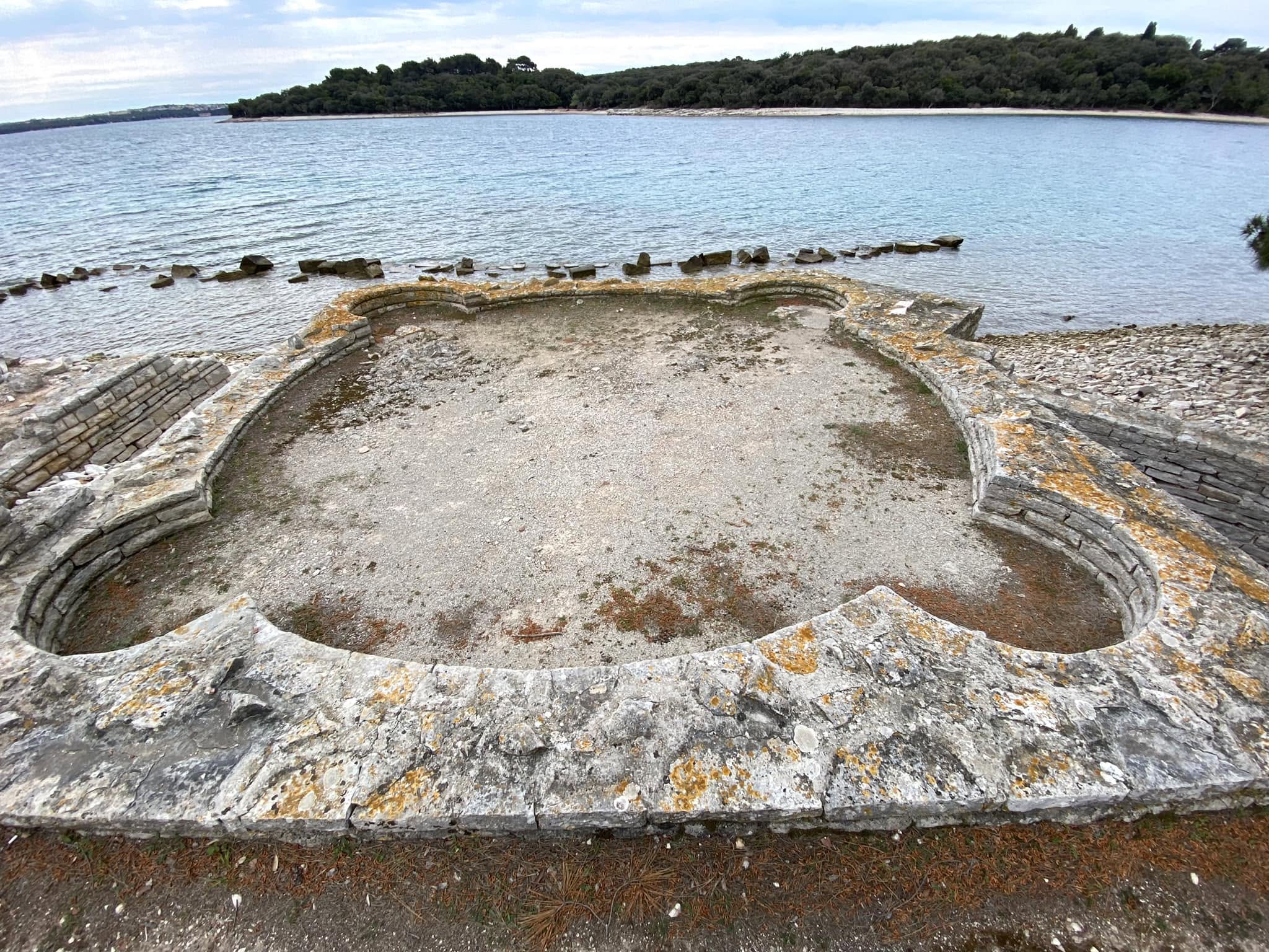 Historic coastal site overlooking a bay on Veliki Brijun