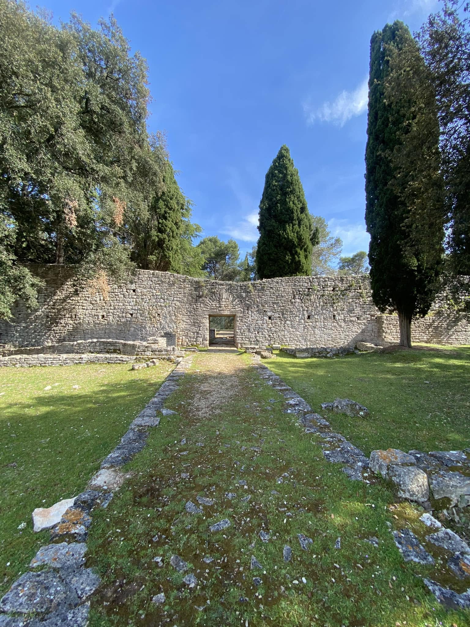 Historic stone remains and cypress trees on Brijuni