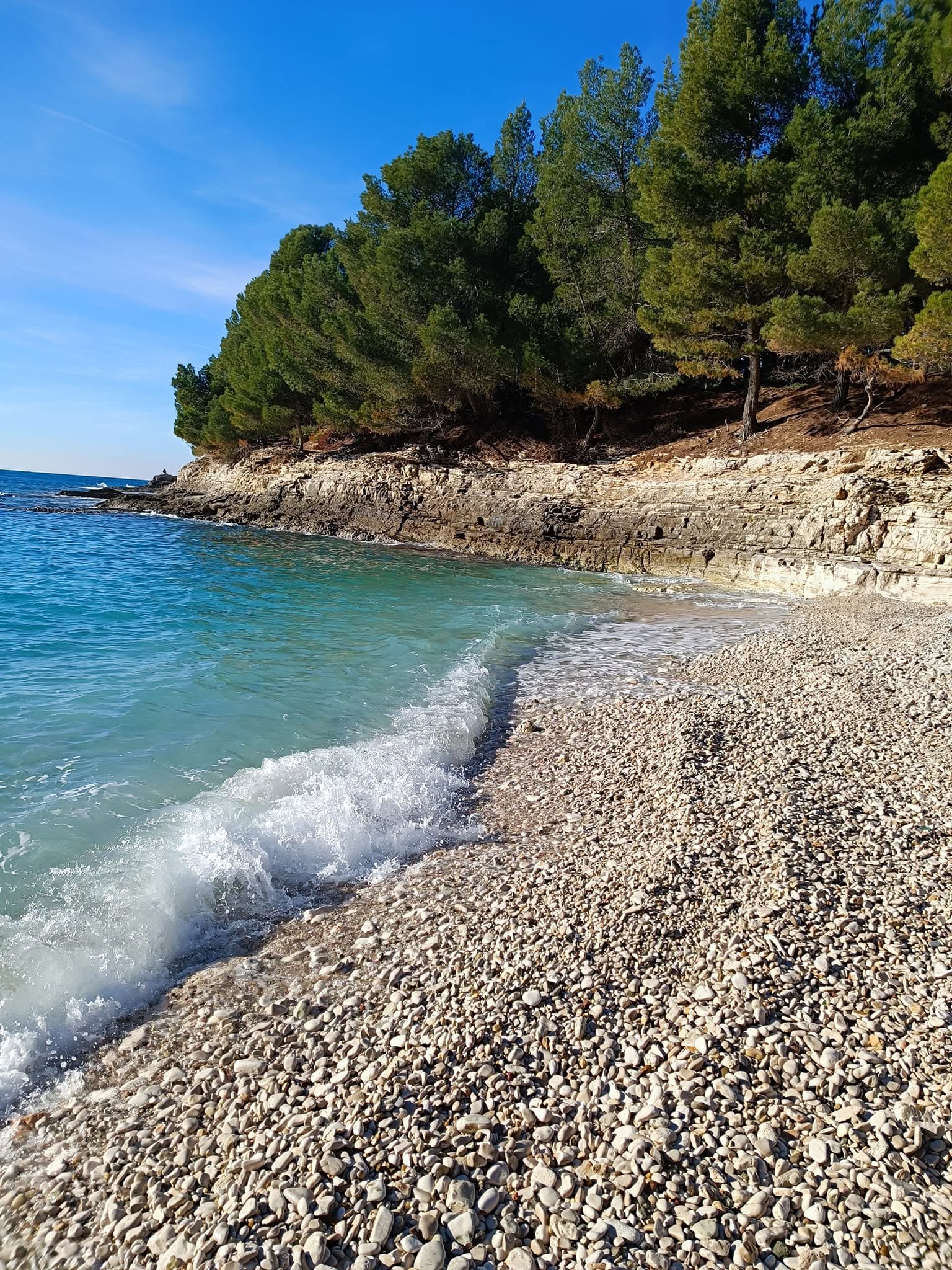Natural pebble cove on Pula's coastline