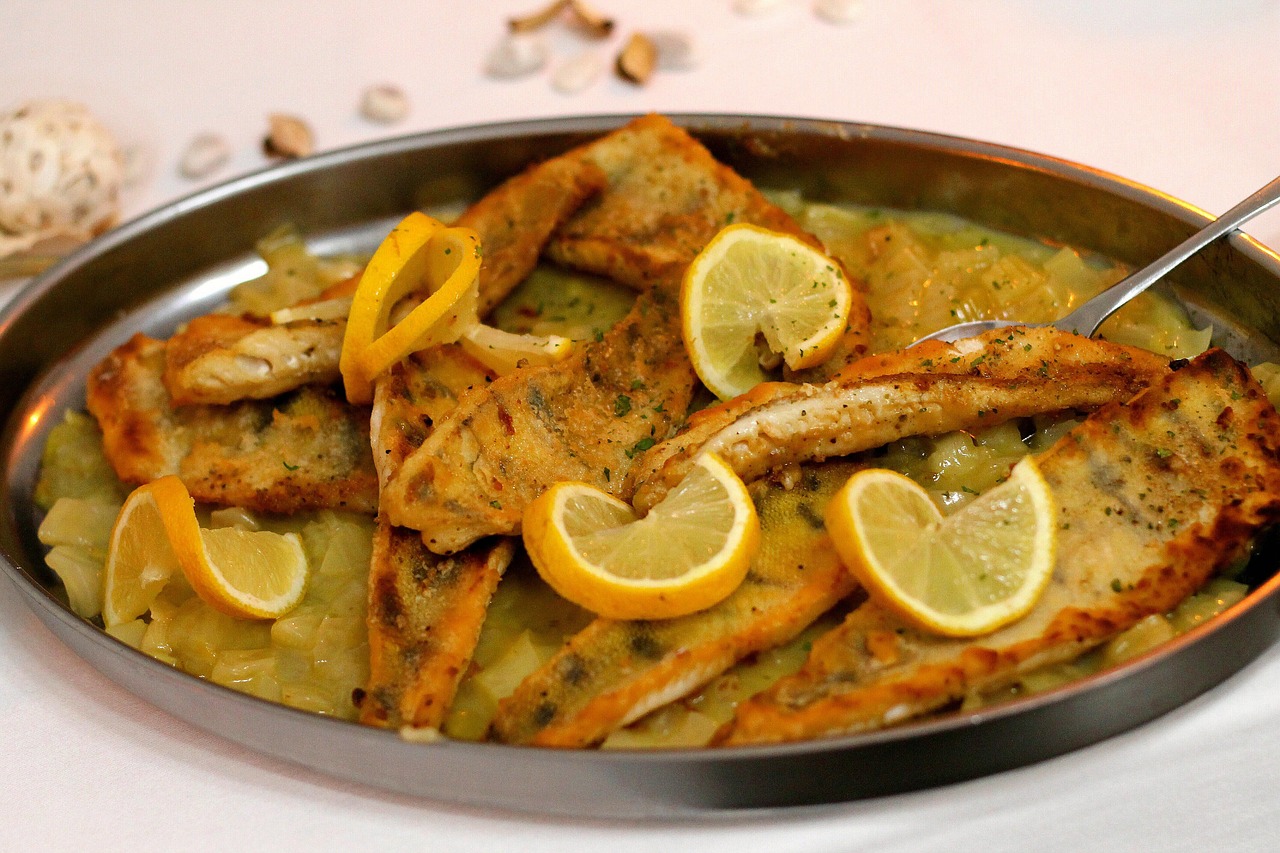 Grilled fish served with lemon